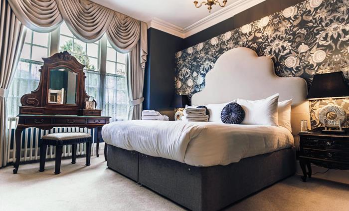 Plas Dinas Country House is a boutique hotel in North Wales. It is a historic country house hotel, the former home of Lord Snowdon